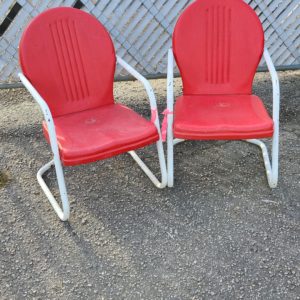 Matching set of red outside chairs