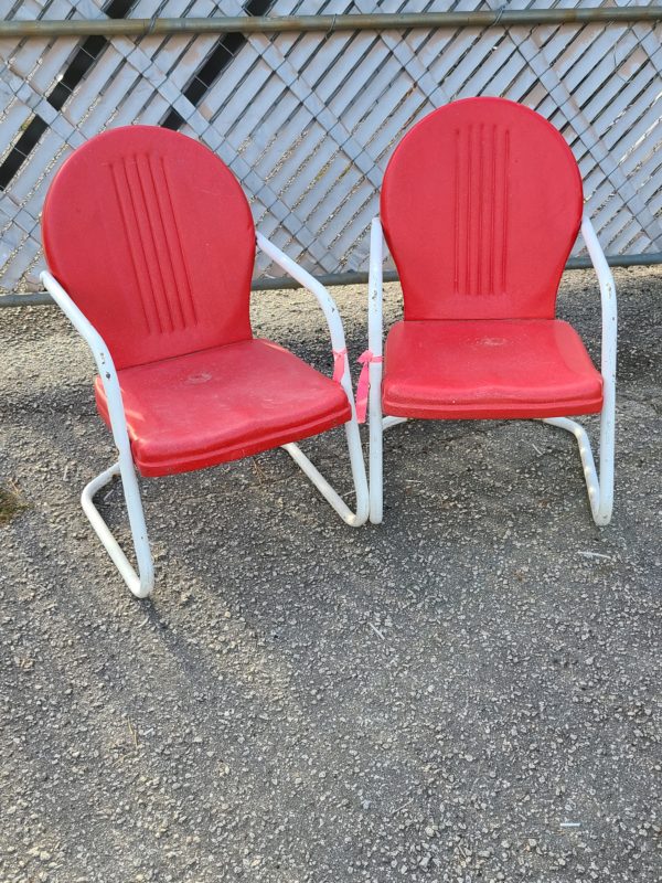 Matching set of red outside chairs